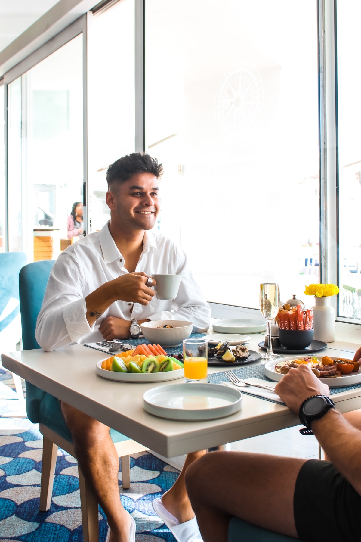 Nick Meyer creating hotel breakfast lifestyle content.
